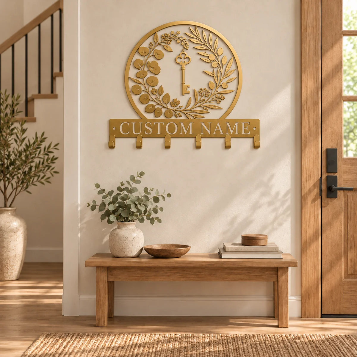 Personalized coat rack with custom name – Gold in an entryway