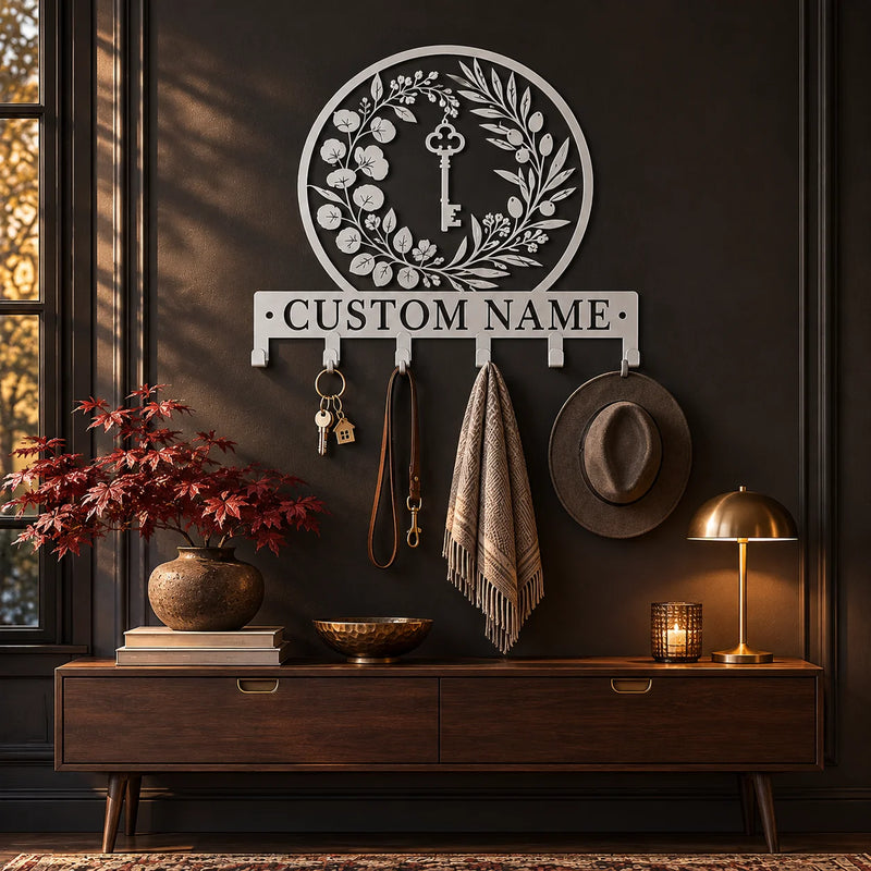 Personalized coat rack with custom name – Silver on a dark wall above a console
